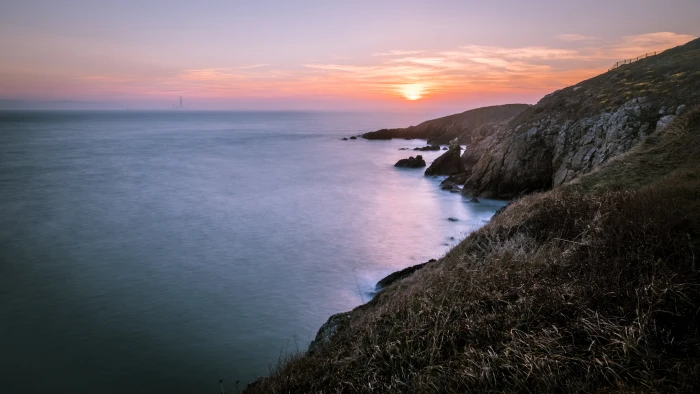 bird's eyeview of cliff and sunset howth dublin ireland 2k