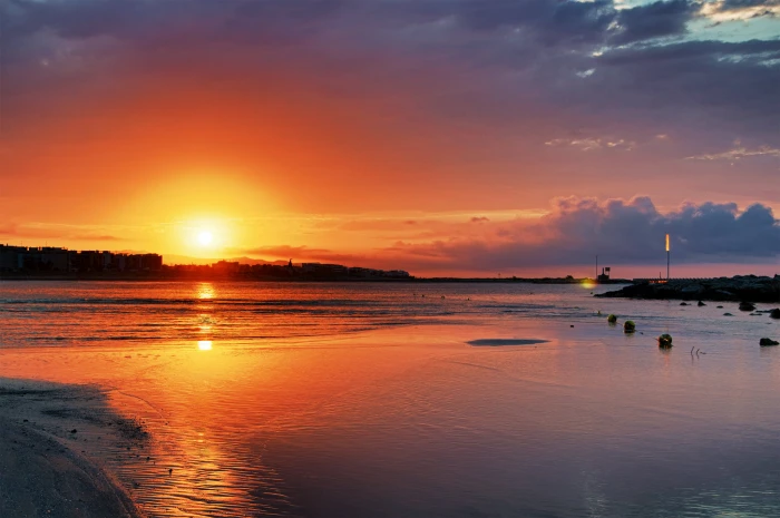 silhouette of land near body water during sunset Sunrise 2k