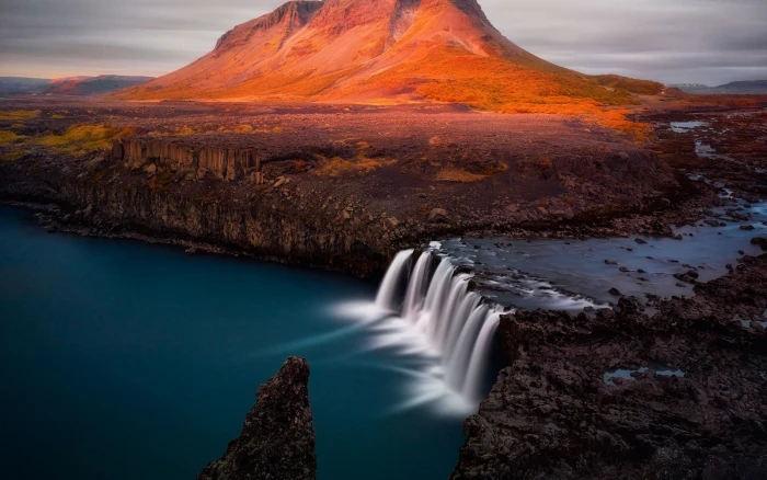 waterfall near brown mountain nature landscape river mountains 2k