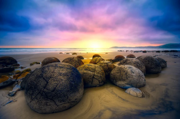 sand beach the sky sunrise stones ocean New Zealand 2k