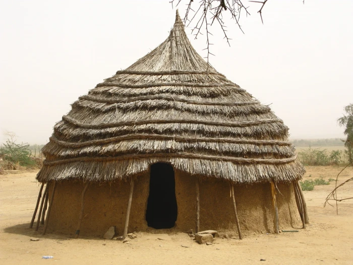 brown hut under white clouds during daytime niger africa home 2k