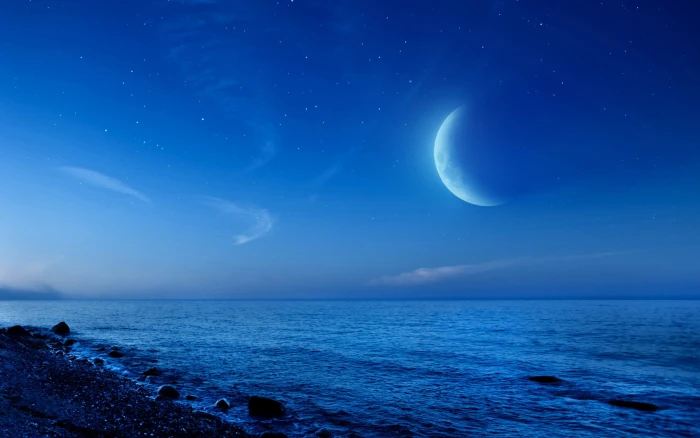 crescent moon above a body of water digital art night beach 2k