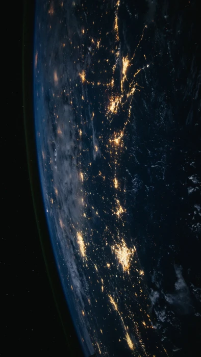 space vertical portrait display ISS night no people nature