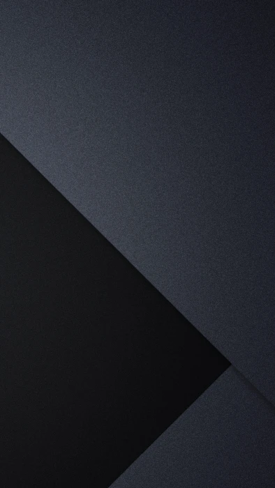 black Sony game console portrait display vertical pattern