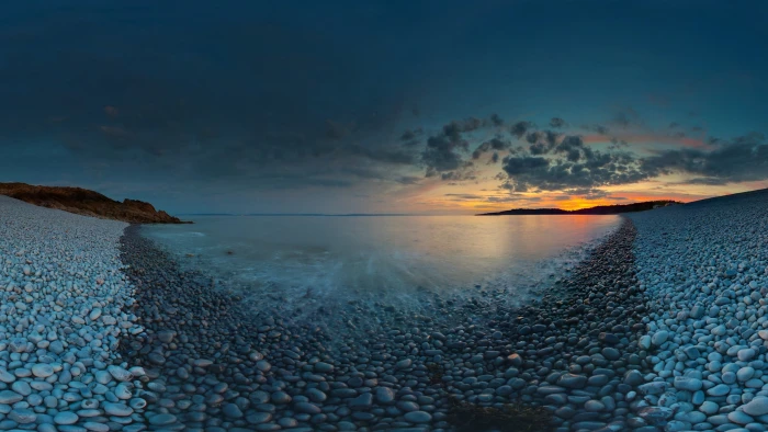 body of water beach sunset rock sea nature sky pebble 2k