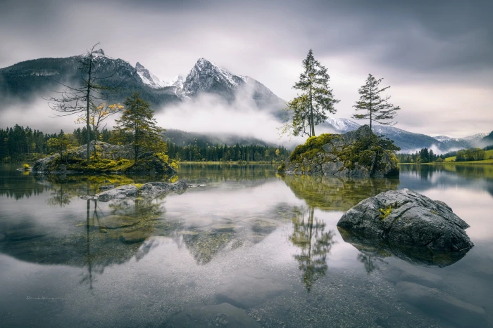 landscape photography of lake near foggy mountain mountains 2k