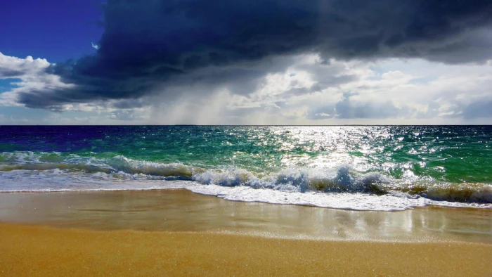 body of water beach sea motion sky wave sport cloud 2k