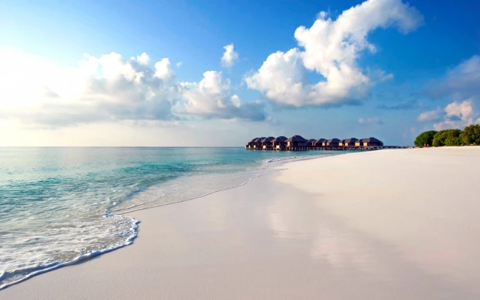 Maldives tropical beach cumulus clouds and white sand Nature 2k