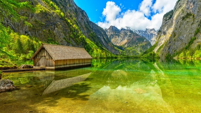 brown wooden shed house background of mountain at daytime 2k