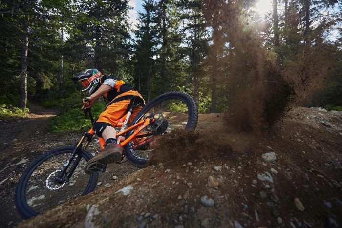 orange and black bike Downhill mountain biking bikes 2k