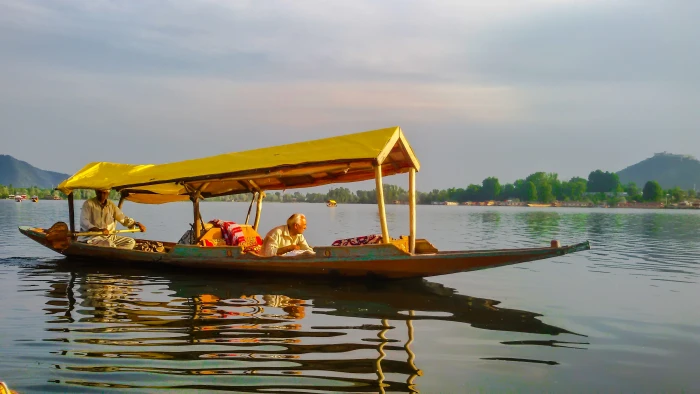 yellow boat in body of water dal lake srinagar landscape 2k