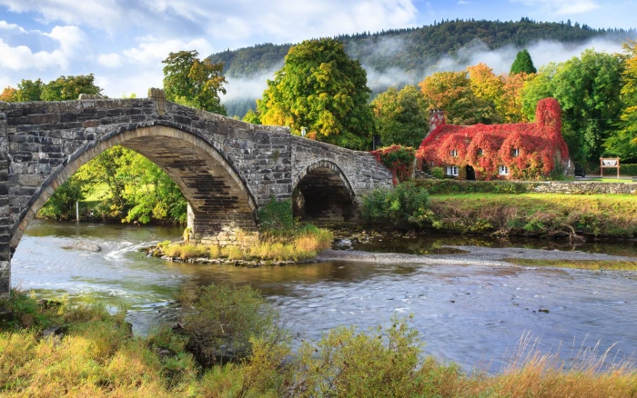 gray concrete bridge Wales UK landscape nature river stones 2k