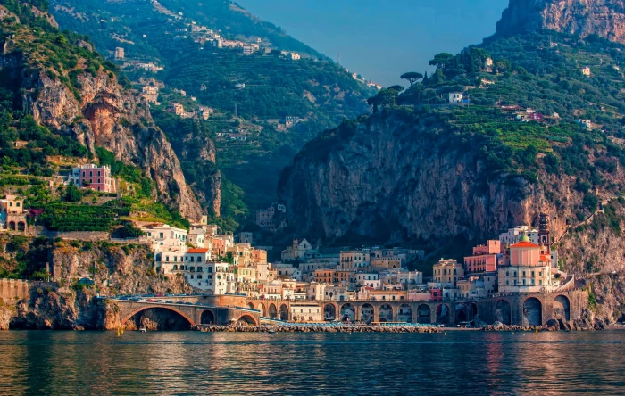 Italy city in mountains village houses near body of water scenery 2k