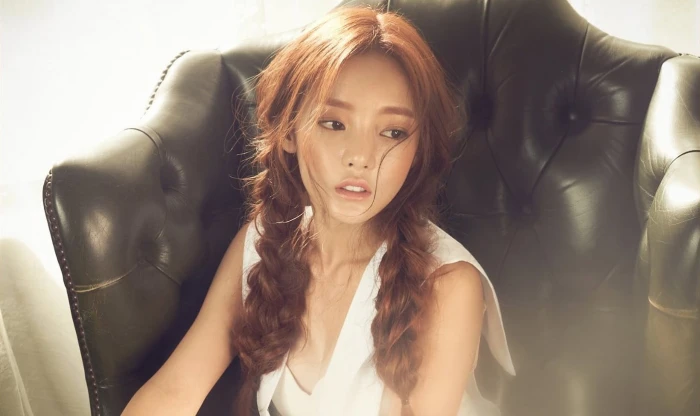 Kara K pop Hara Korean women Asian chair looking away
