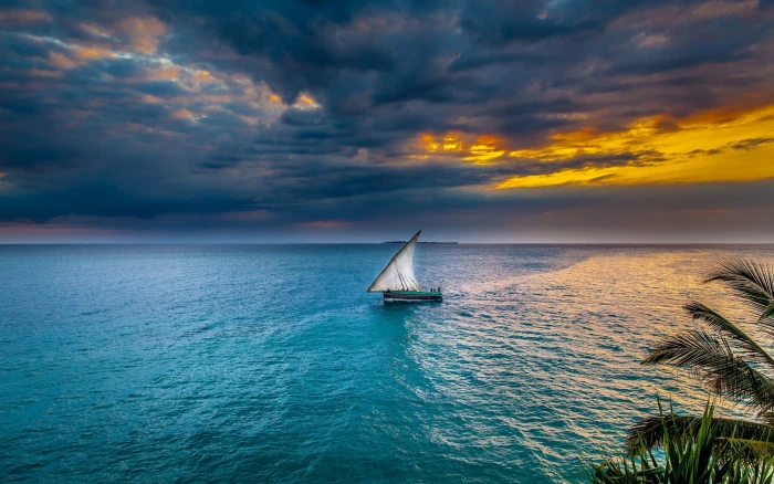 sailboat on body of water sunset sea sky sailing ship nature 2k