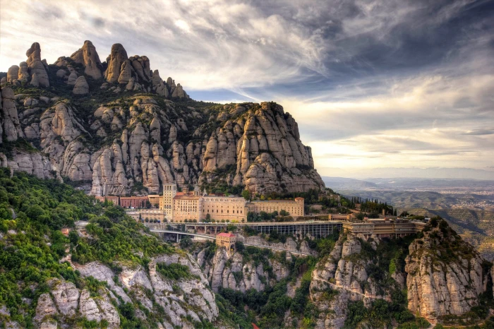 Santa Maria de Montserrat monastery Spain Barcelona brown rock mountain 2k