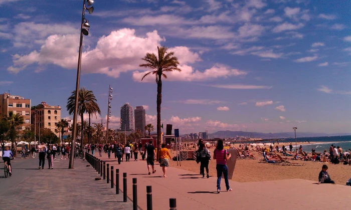 barcelona barceloneta beach architecture sky large group of people 2k