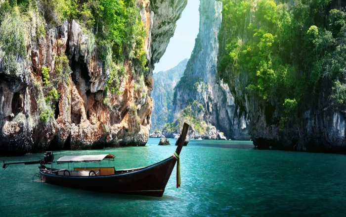 Long Boat And Rocks On Railay Beach In Krabi Thailand E 2k