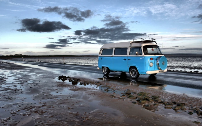White and Blue Van on Road beach campervan drive ocean sand 2k 4k