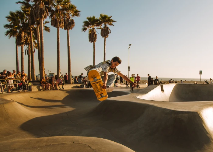 time lapse photo of man riding skateboard at skate park person 2k 4k
