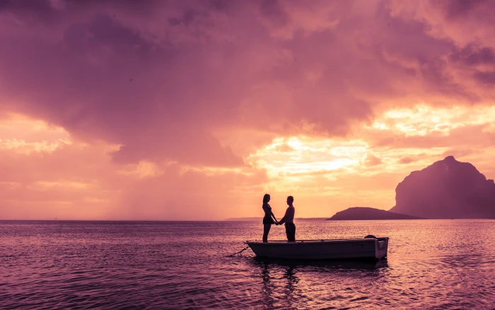Ocean beach romantic couple boat sunset silhouette water sky 2k 4k