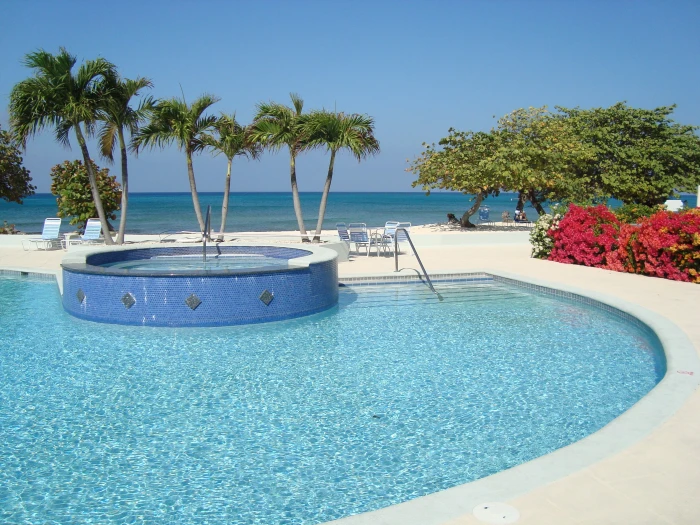 round swimming pool near beach grand cayman summer water resort 2k