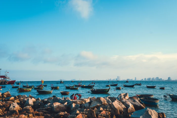 boats on water under blue and white sky beach da nang viet nam 2k 4k 5k