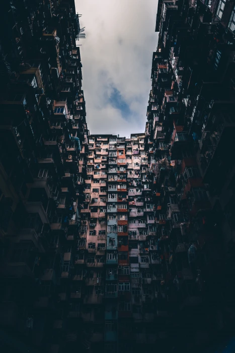 low angle photography of multicolored concrete building during daytime 2k 4k