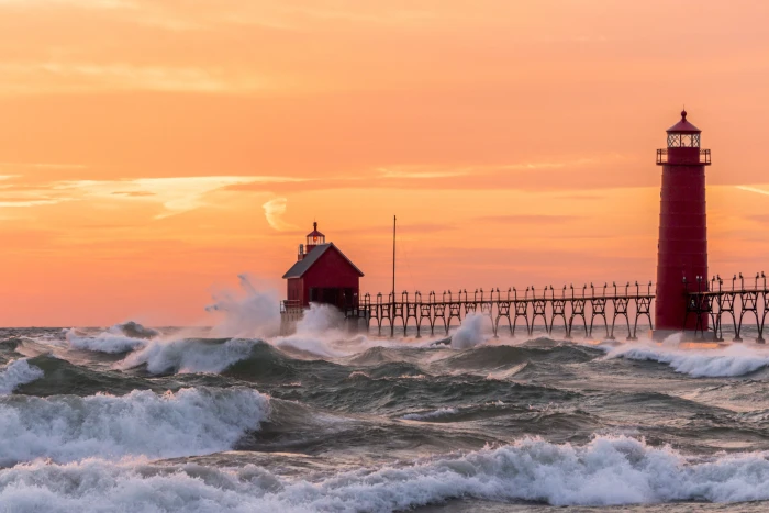 ocean waves near red light house during sunset lake michigan 2k 4k 5k