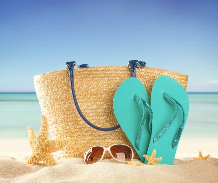 pair of teal flip flops and brown tote bag sand sea beach 2k 4k 5k