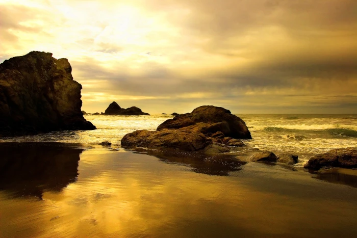 rock formation near body of water during daytime Lost Sensations 2k 4k