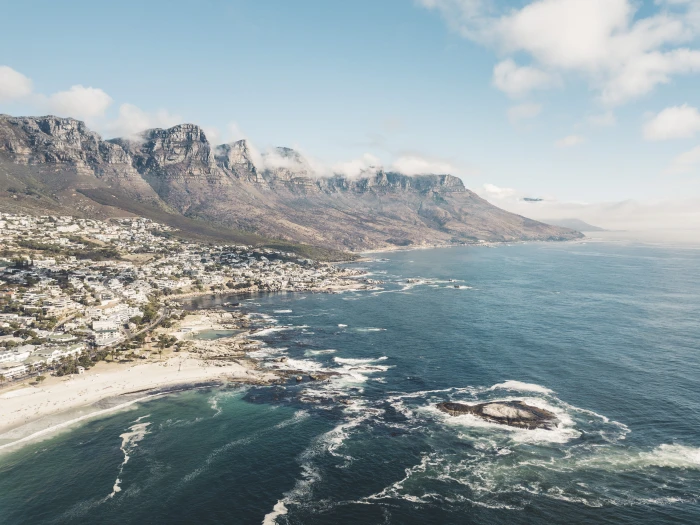 aerial view photography of seashore island and body water 2k 4k