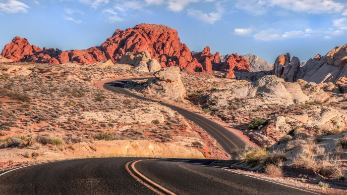 black asphalt road mountains desert clouds warm colors landscape 2k 4k