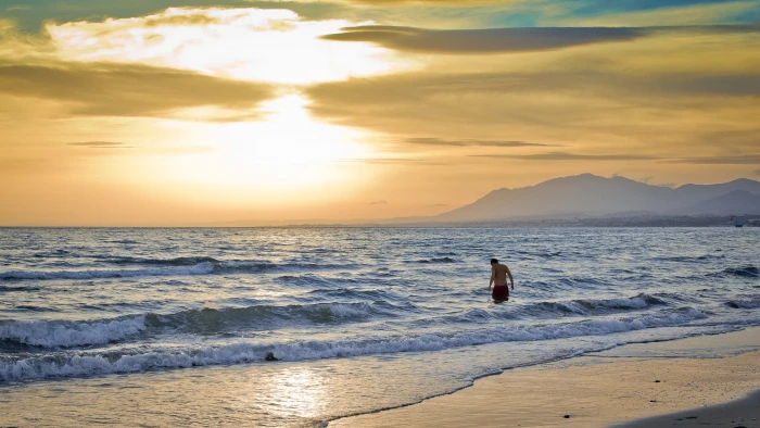 man on beach long exposure photography Sunset hombre chico 2k 4k