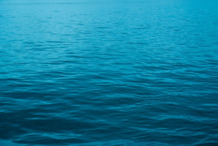 photo of still body water blue ocean sea current nature 2k 4k 5k
