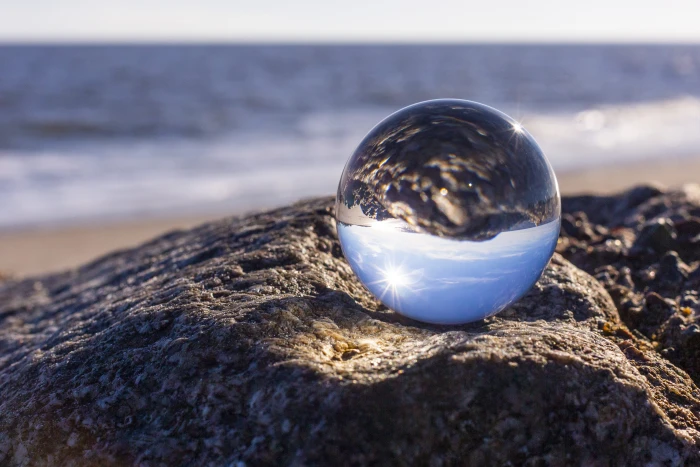 reflection rocks sea beach ocean lensball sphere crystal ball 2k 4k 5k