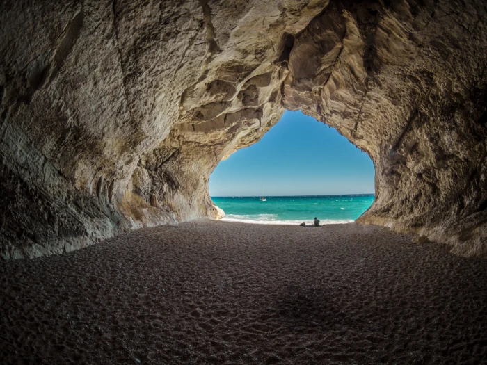 brown and white cave italy cala gonone air sky clouds partly cloudy 2k 4k 5k