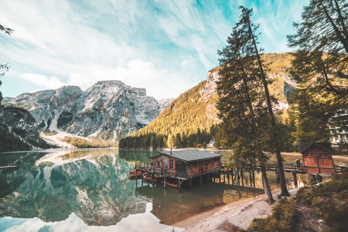 Old Wooden House on Braies Lake Italy Dolomites autumn beautiful 2k 4k 5k