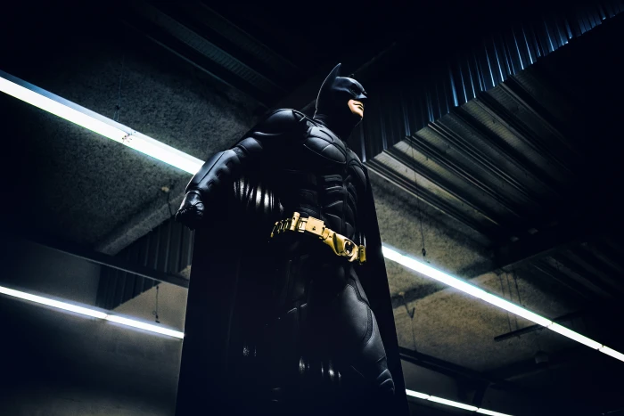Batman standing under steel roof inside building 2k 4k 5k