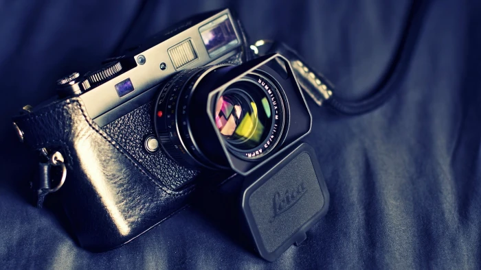 black rangefinder camera photography of and silver SLR 2k