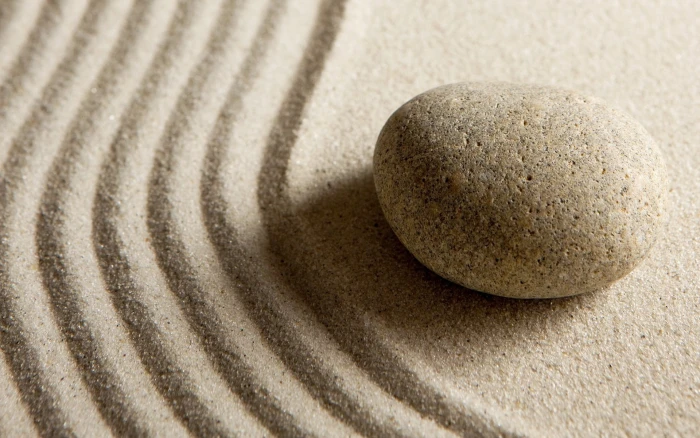 gray stone at sand nature photography macro sunlight 2k