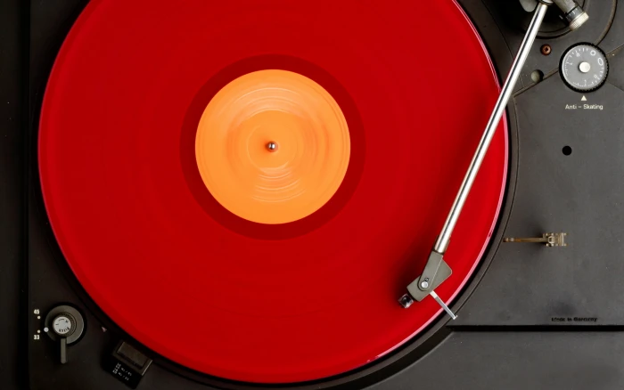 red vinyl record player macro music background DJ turntables 2k