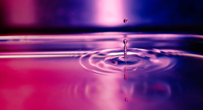 water droplet creating ripple effect Just a drop of 2k 4k