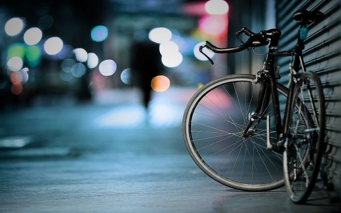 black road bike depth of field bicycle bokeh street shutters 2k