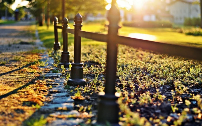 Close up Fencing black metal framed balustrade fence grass 2k