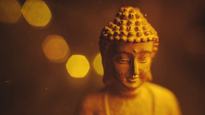 macro Buddha lights warm moody closeup still life bokeh 2k