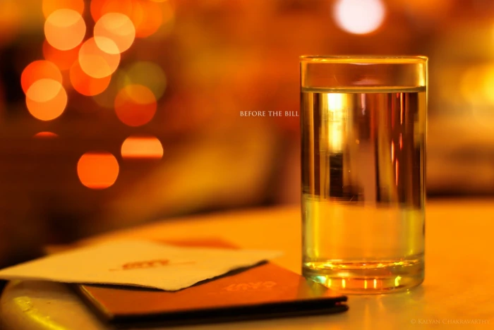 selective focus photography of drinking glass the bill color 2k