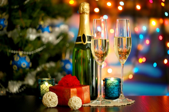 selective focus photography of flute glasses beside champagne bottle 2k 4k 5k