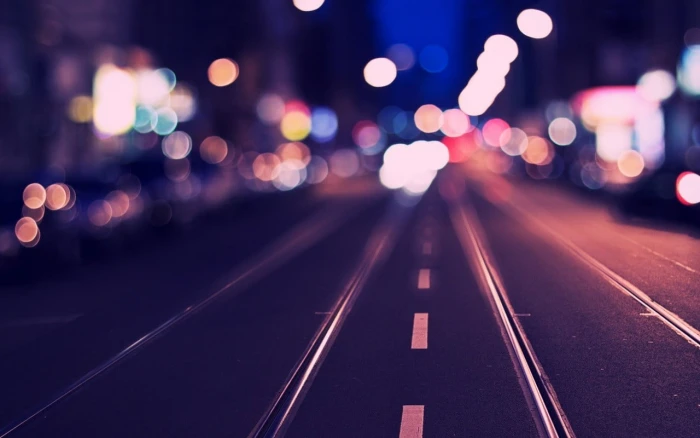 time lapse photography of road bokeh city night traffic street