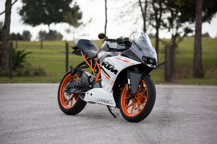 white and orange KTM sports bike selective focus photography 2k 4k